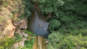 Drone photograph of Polylimnio Waterfalls in Greece.