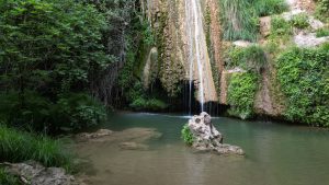 Drone photograph of Polylimnio Waterfalls in Greece.